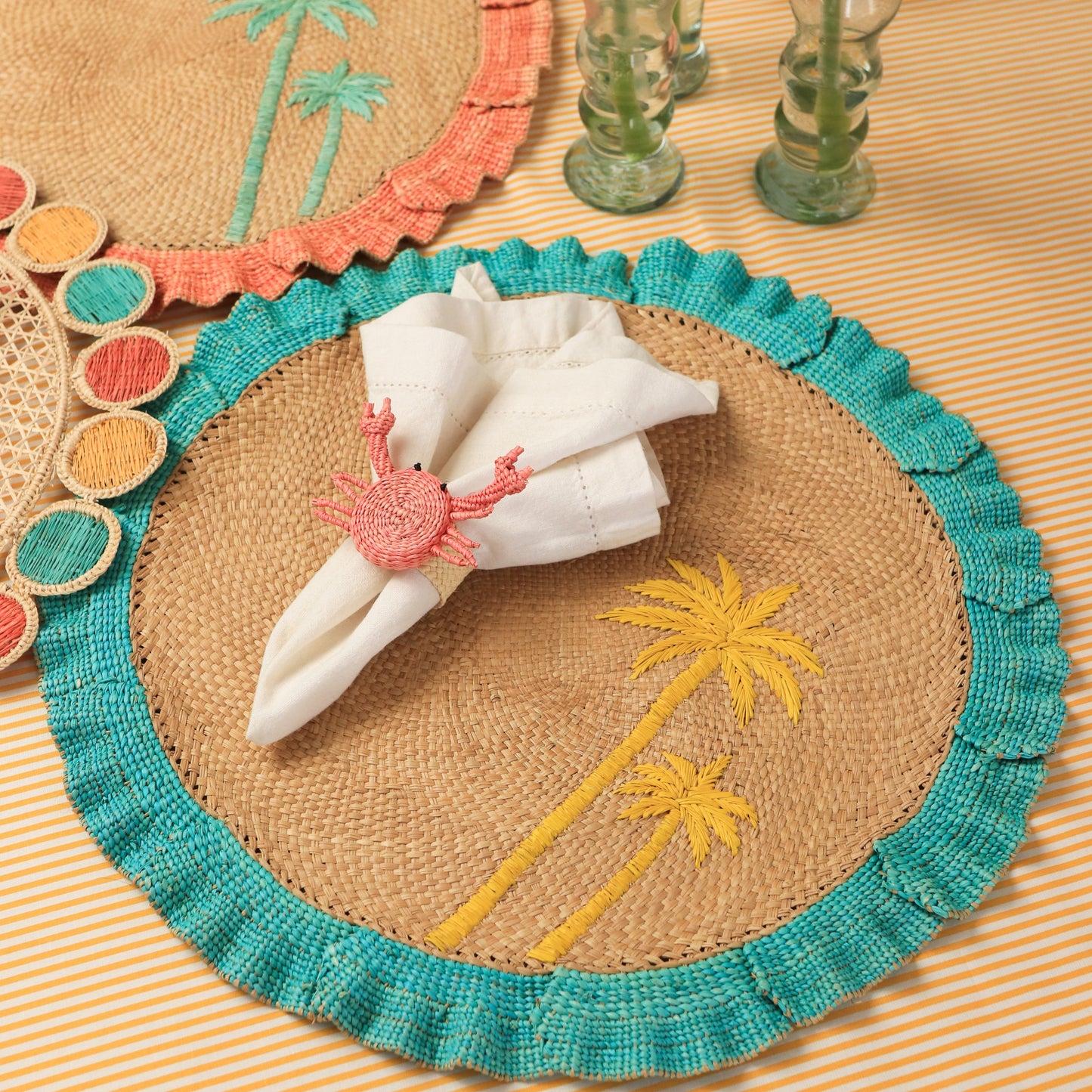 Decorative woven placemats with palm tree designs 