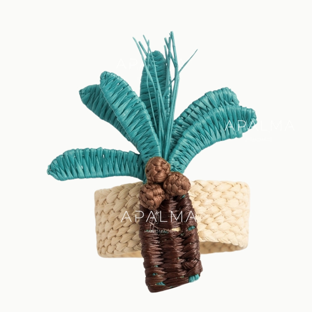 Decorative plant with teal leaves and brown base on a white background, featuring the brand 'APALMA'.